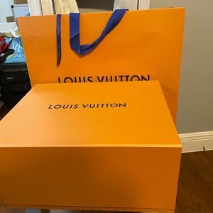 Louis Vuitton empty box and bag w ribbon.
